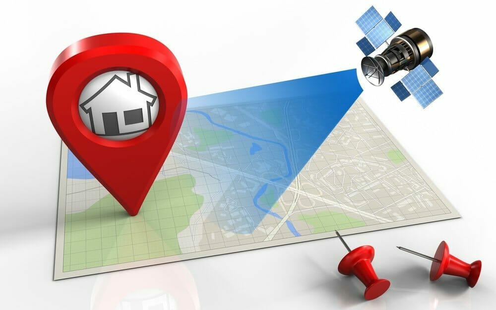 Un símbolo de dirección y ubicación del mapa con una casa, un satélite y 2 pines.